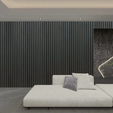 Modern living room featuring a sleek sofa, dark acoustic slat wall