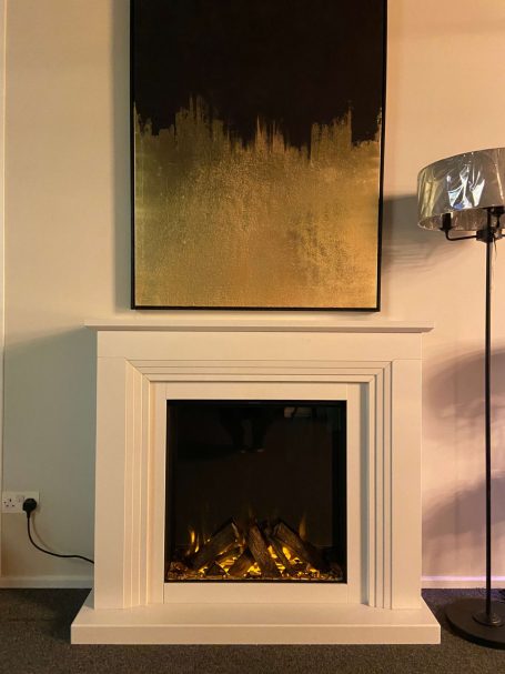 british fires 650sq electric fire in a stone fireplace