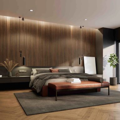 Modern bedroom with wooden panel walls, a large bed, and contemporary decor.
