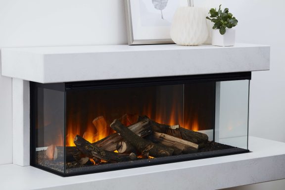 Brockenhurst electric fire with glass front and sides with real wooden logs