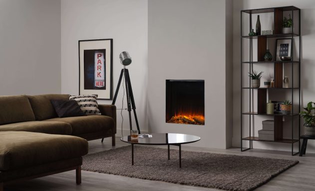 Modern living room with a cosy sofa, minimalist decor, and a electric 650sq fireplace.