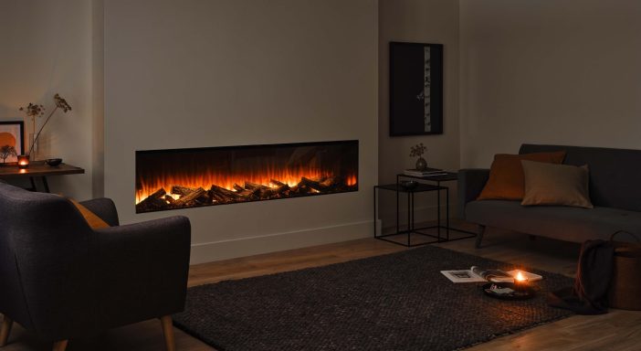 Modern living room featuring a wall-mounted modern electric fireplace, a sofa, and a dark rug.