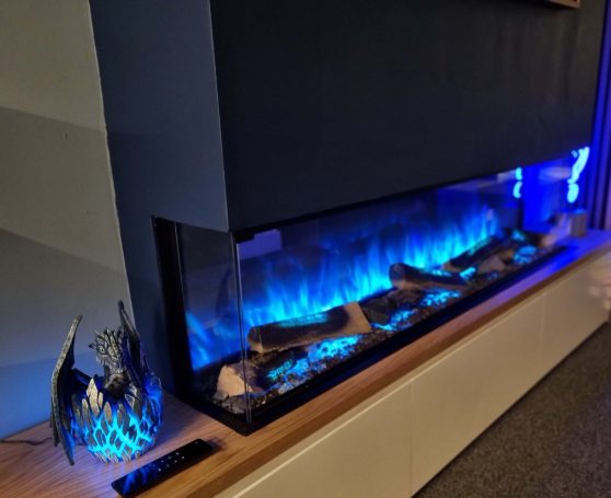 Modern electric fire with blue flames