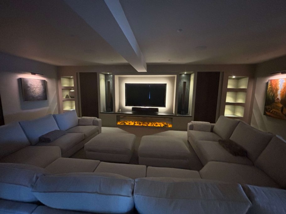 Spacious modern living room with a large TV and a2400 electric fire