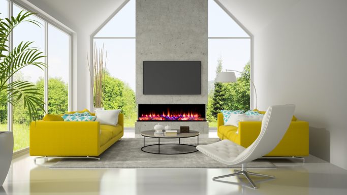 Iconic 2000 modern electric fire inside of a media wall with TV above it